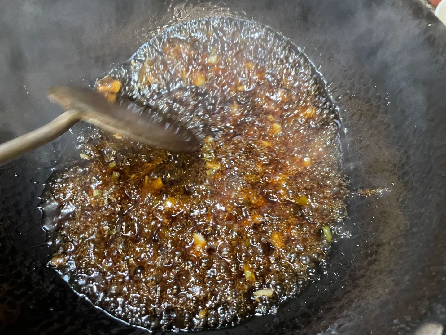 The vibrant glaze on traditional sweet and sour pork