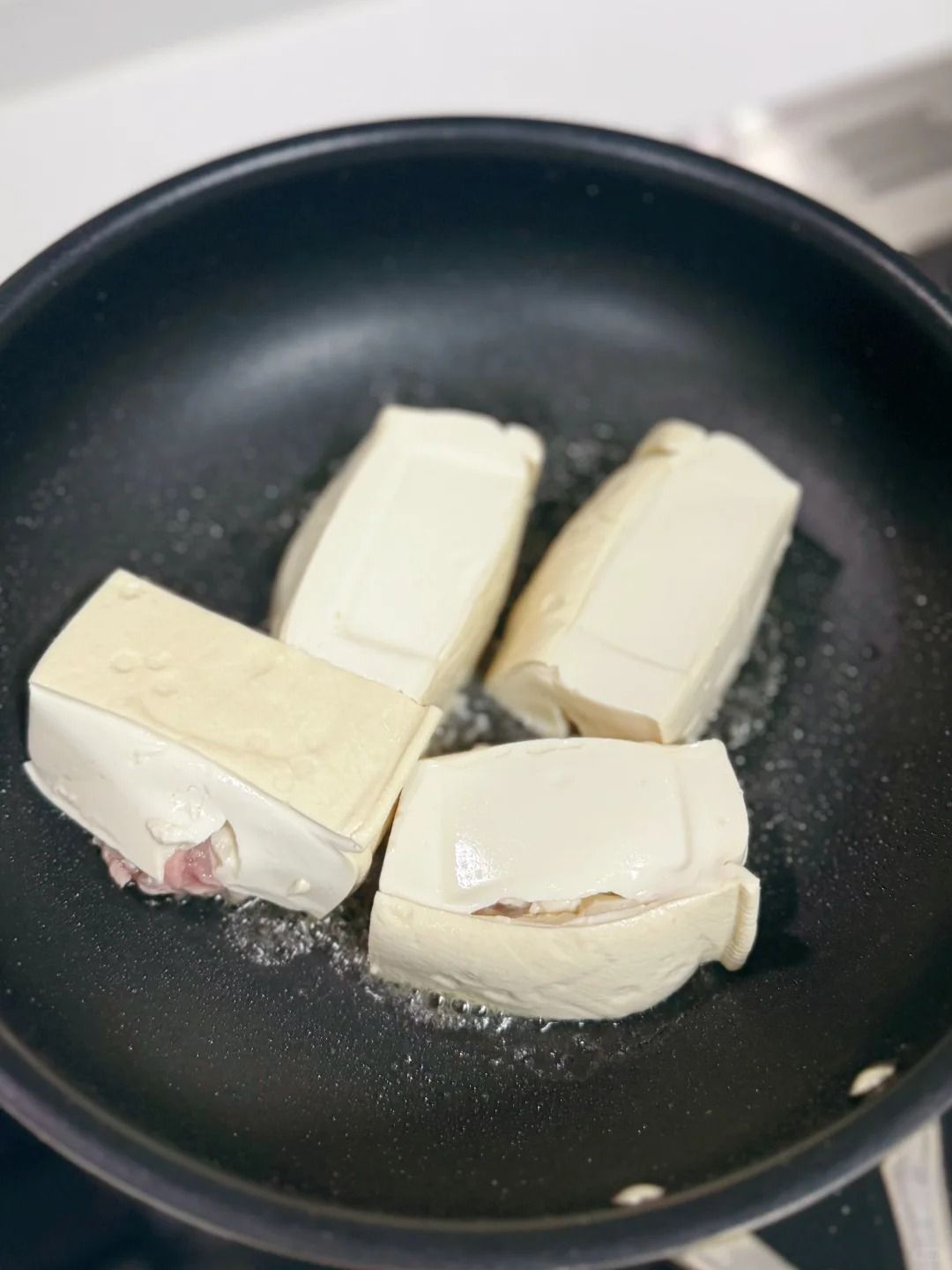 Searing tofu in a pan