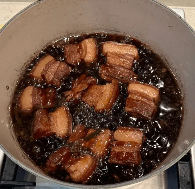 Braising the pork to perfection