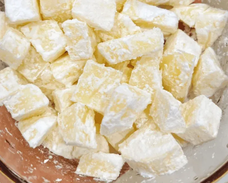 Coated ribs ready for frying