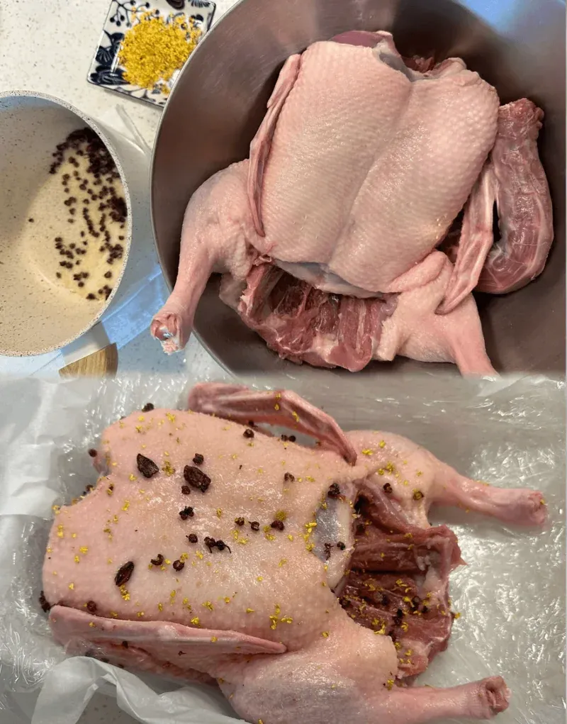 Duck being rubbed with spiced salt