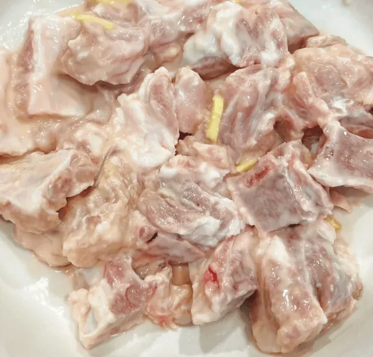 Marinated ribs ready for coating